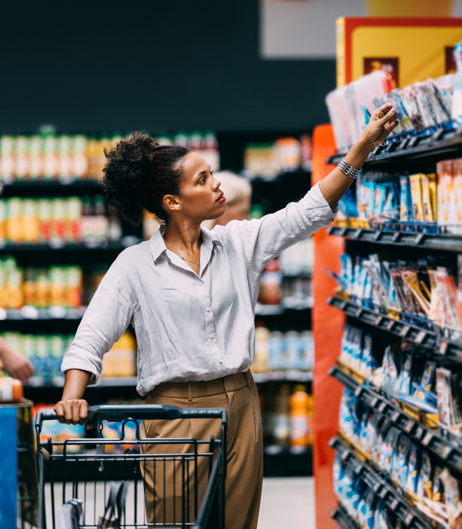 woman shopping at supermarket
