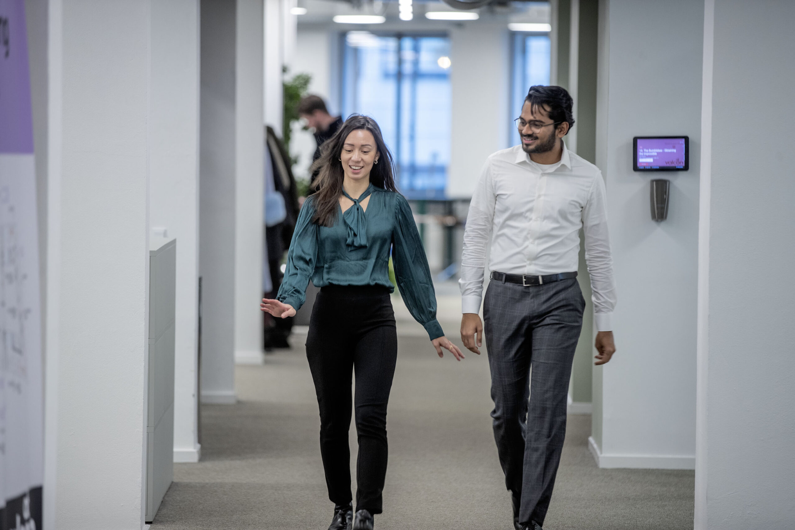 People walking in office