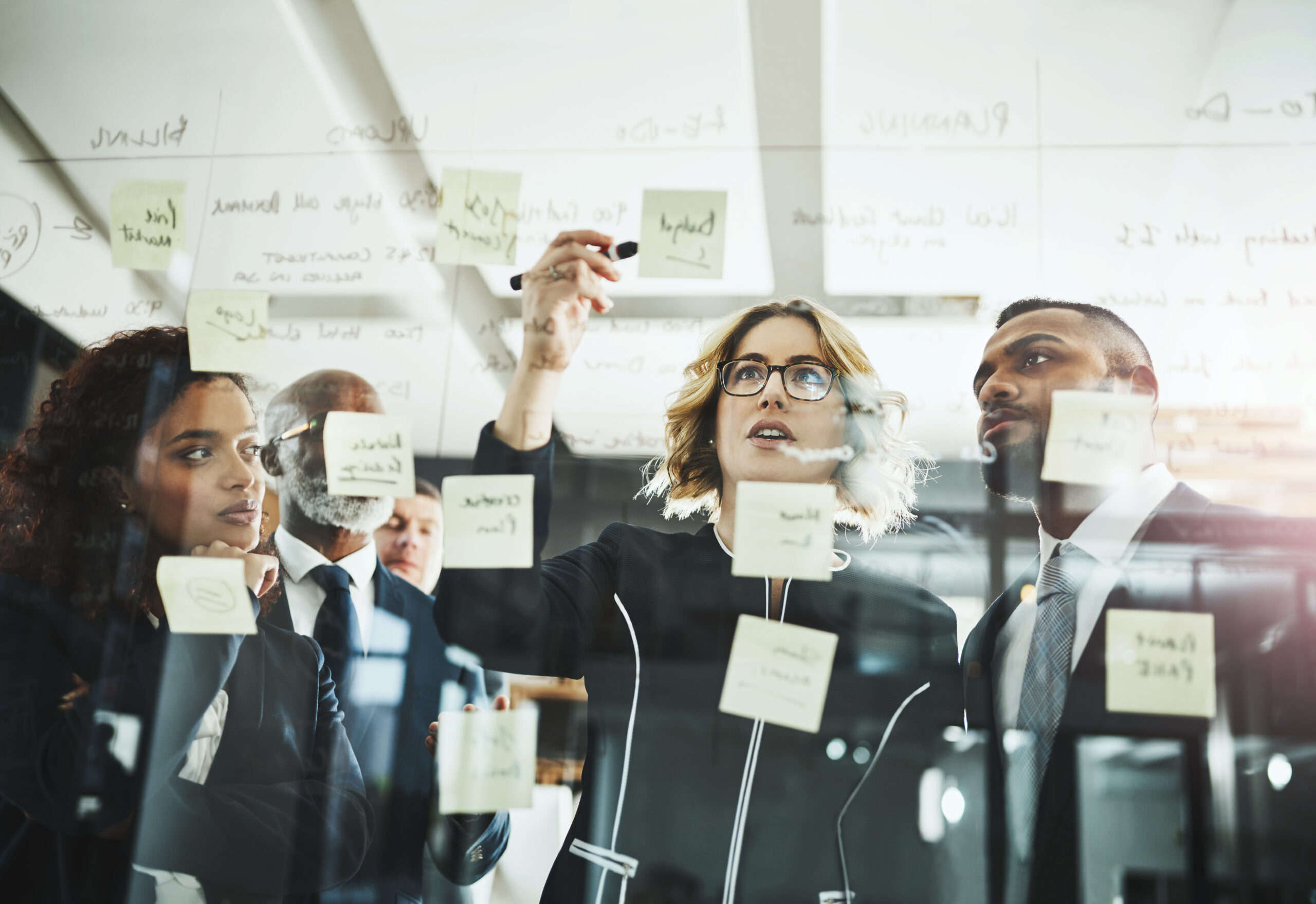 Shot of a group of businesspeople having a brainstorming session in a modern office