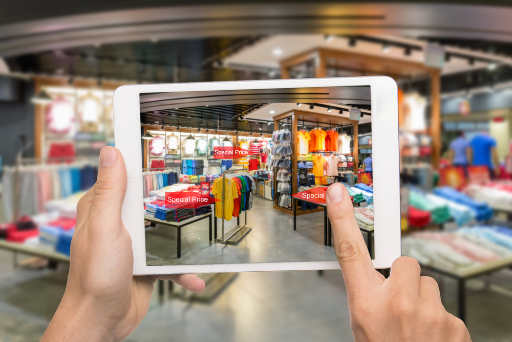 Tablet taking picture of a shop and its products