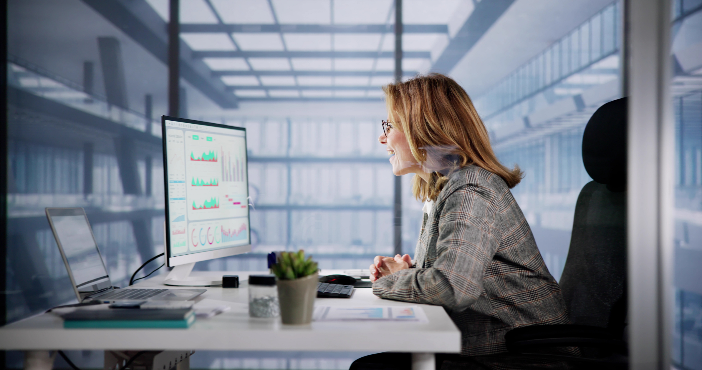 Excited Business Analyst Using Computer